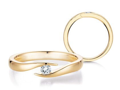 Anillo de compromiso Twist en 14K oro amarillo con diamante 0,10ct H/SI