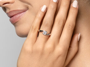 Anillo de compromiso Twist en platino 950/- con diamante 0,50ct G/SI