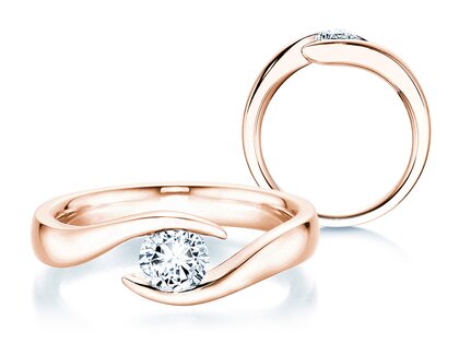 Anillo de compromiso Twist en 18K oro rosa con diamante 0,50ct G/SI